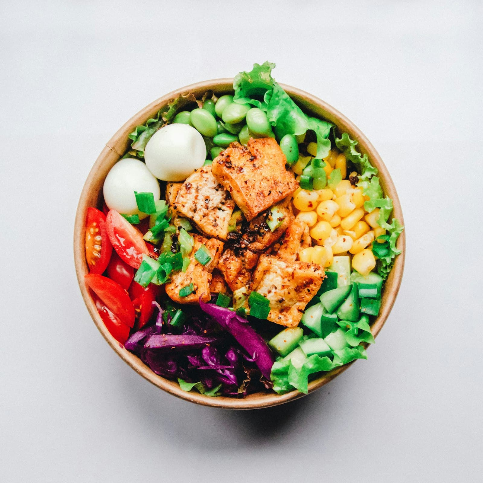 Healthy meal prep containers with protein and vegetables representing macro calculation for weight loss