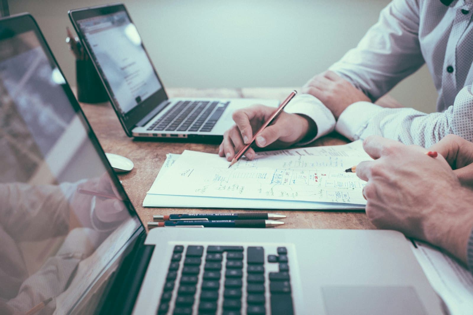 Person reviewing paycheck and financial documents representing pay stub line items explained